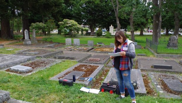 Hard at work, the cemetery has numerous time periods, types of monuments and people from across the globe. Photo Credit: Unknown. May 24th, Camera 2.