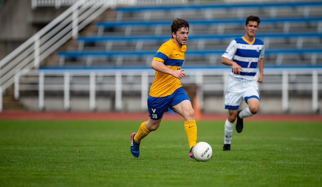 Will Adams on the soccer pitch for the UVic Vikes.