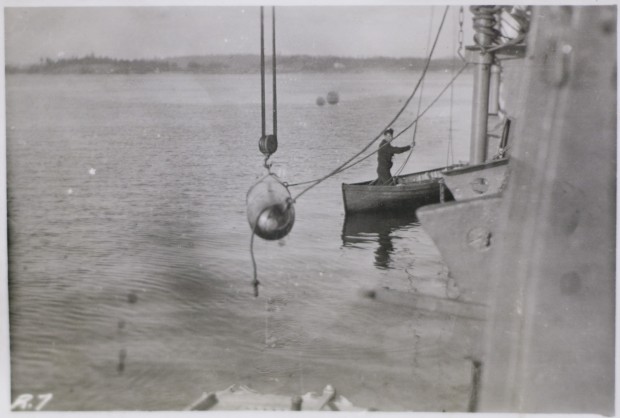 Prepping for torpedo practice. Image Source: Maritime Museum of British Columbia. 