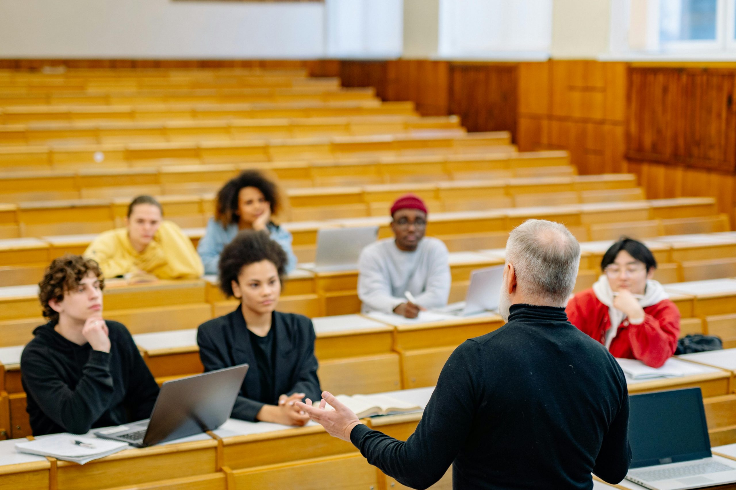 Professor teaching a diverse group of students