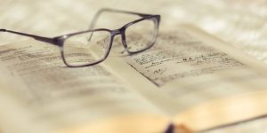 Book open with glasses