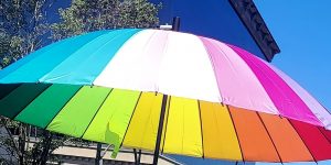 Rainbow umbrella in the sun