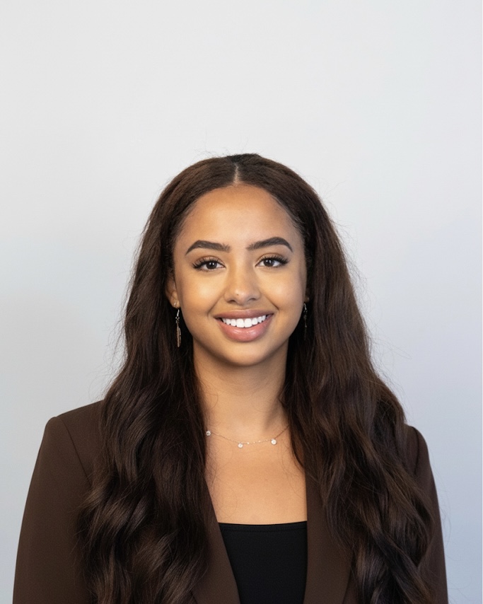 The photo shows a headshot of JD/JID student Salena Thomas.