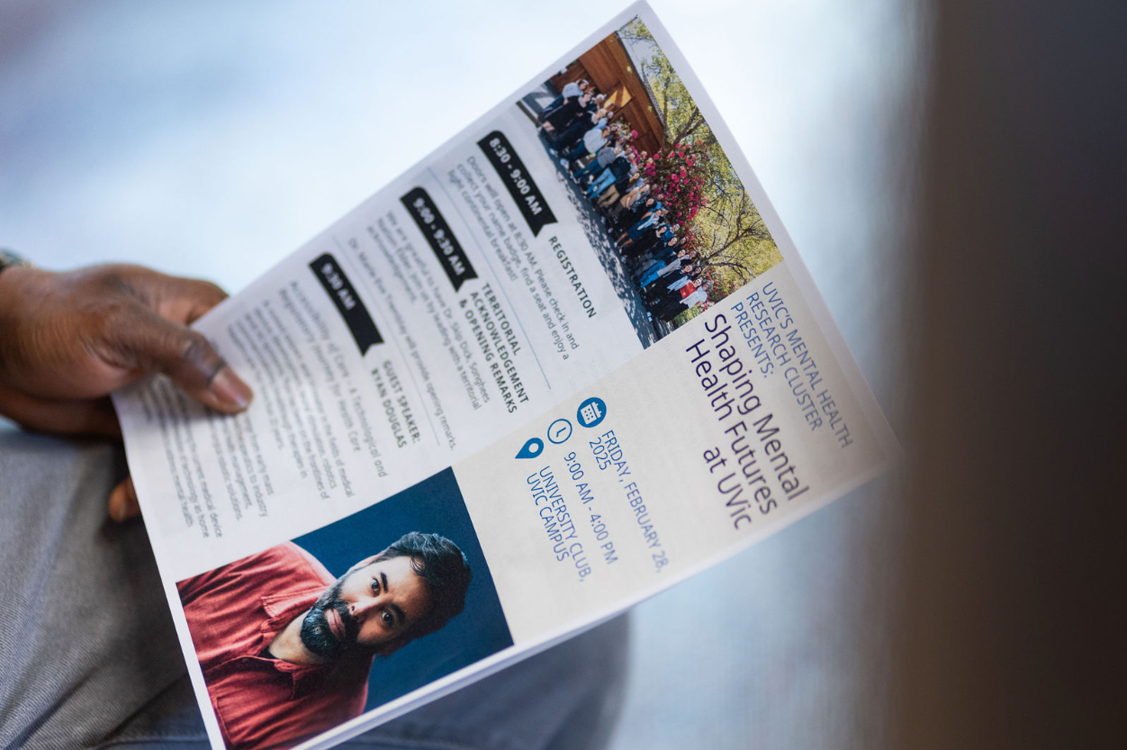 Paper program for the Shaping Mental Health Futures at UVic workshop featuring a picture of Ryan Douglas. 