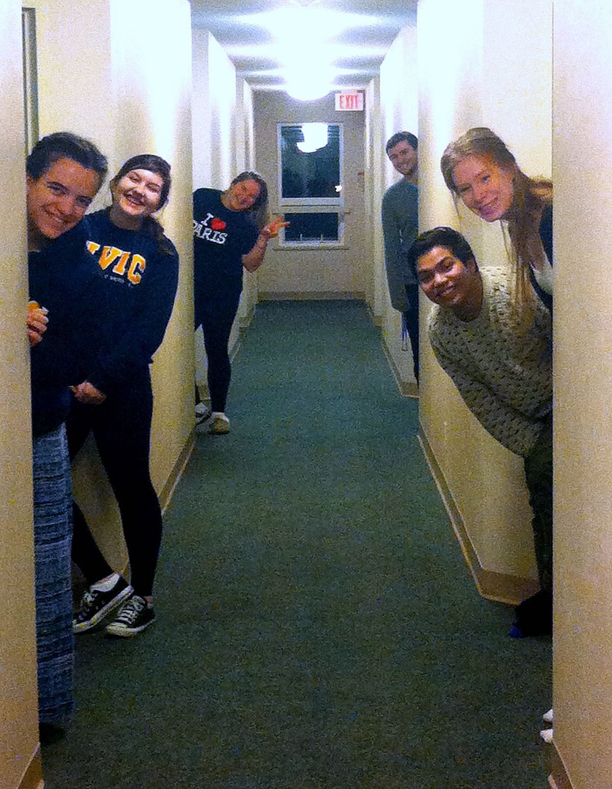 students in residence hallway