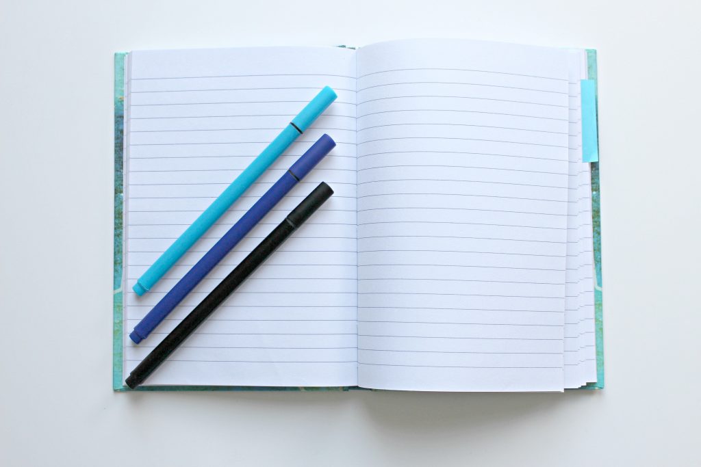 notebook with 3 pens