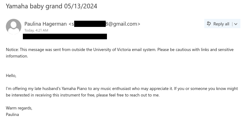 A typical scam email offering a free piano