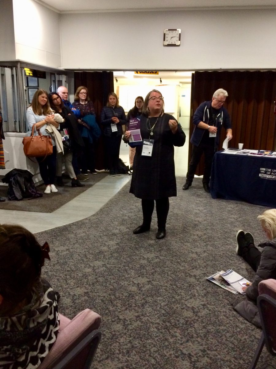Author Monica Prendergast speaks to a crowd at the launch of her book, Web of Performance.