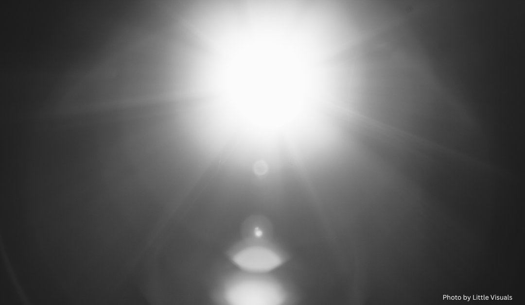 A black and white photograph of the sun taken with a fish-eye lens.