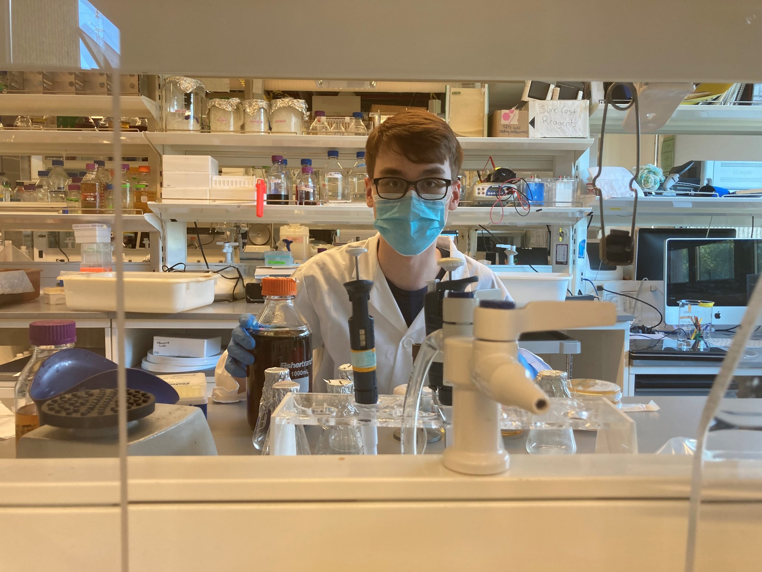 student in research lab