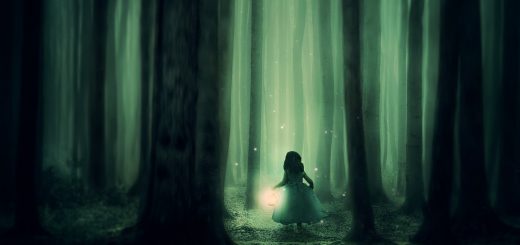 Little girl in a dark forest