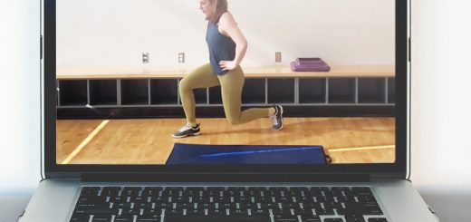 laptop with a fitness instructor showing on screen