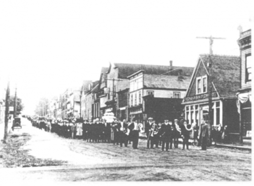 The funeral procession for Goodwin down Dunsmuir Ave in Cumberland. Source: Cumberland Museum