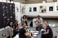 Artists and instructors setting up Kunstraum/A Relational Space